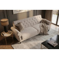 Designov&aacute; chesterfield rozkl&aacute;dac&iacute; sedačka Maison Belle Affaire pro tři osoby s b&eacute;žov&yacute;m bukl&eacute; potahem 220 cm