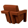 Luxusn&iacute; art deco křeslo Phineas s celoplo&scaron;n&yacute;m potahem ve sp&aacute;len&eacute; oranžov&eacute; barvě s designov&yacute;mi geometrick&yacute;mi opěrkami 75 cm