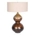 Luxusní moderní designová stolní lampa Calabasas s kovovou podstavou se dvěma rozšířený břichami se starožitným patinovaným efektem v odstínech hnědé a zlaté se smaltovaným povrchem s kulatým textilním stínítkem ze lnu v béžové barvě