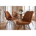 Designov&aacute; retro hněd&aacute; j&iacute;deln&iacute; židle Scandinavia s čalouněn&iacute;m s žinylkov&yacute;m potahem a černou kovovou podstavou 50 cm