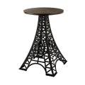 Designový industriální kulatý barový stůl Eiffel s vrchní deskou z masivního magového dřeva v tmavě hnědé barvě a podstavou ve tvaru Eiffelovy věže z kovu v matném černém provedení