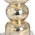 Tall antique gold glass candle column.
