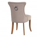 Designová jídelní židle Ondine slonovinové barvy s kruhovým klepadlem 96cm
