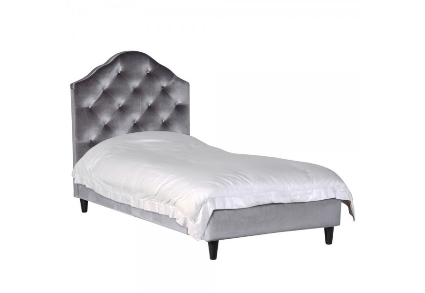 Luxusní čalouněná postel Alcala I s Chesterfield prošíváním a černými masivními nohami 98cm