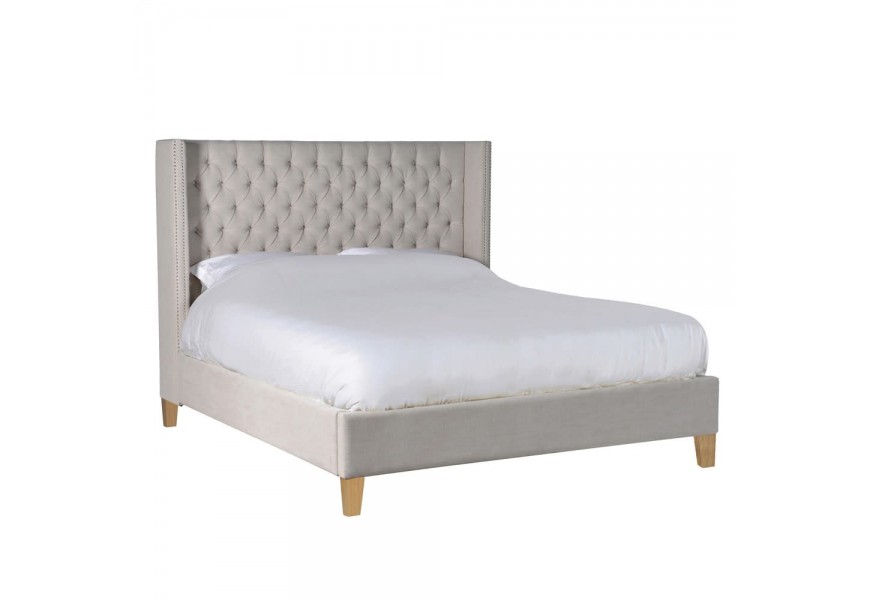 Luxusní béžová Chesterfield postel Heidy s lněným potahem a bledými dřevěnými nohami 194cm