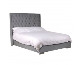 Luxusní šedá postel v chesterfield stylu Guadisa s lemováním v podobě kovových cvoků 176cm