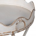Vintage bledý kulatý příruční stolek Curle s překříženýma nohama 48cm