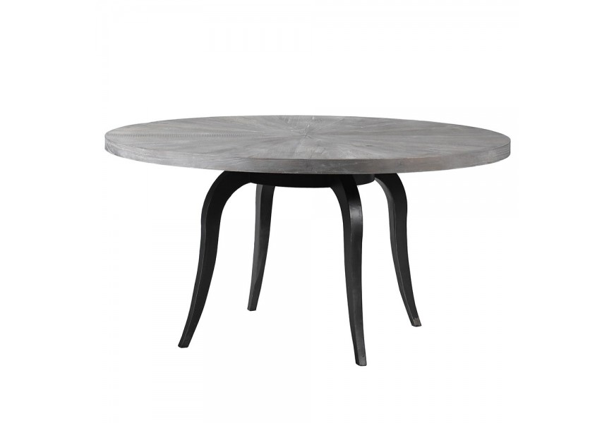 Kruhový jídelní stůl ve vintage stylu s černými kovovými nohami a s šedou strukturovanou povrchovou deskou