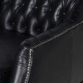 Luxusní černé křeslo z pravé kůže v Chesterfield stylu s dřevěnými nohami z masivu 87cm