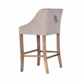 Designová barová židle Westend s klepadlem v béžovém čalounění s dřevěnými nožičkami 105cm