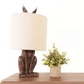 Designová stolní lampa Králíček Ušák v hnědé barvě s bílým stínidlem 50 cm