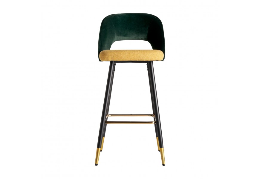 Designová moderní barová židle Dosiee na černých nohách s luxusním zeleně-žlutým potahem v art-deco stylu