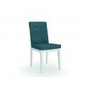 Designová jídelní židle Cerdena s modrým potahem a bílými masivními nohama