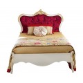 Exkluzivní čalouněná postel Pasiones z masivu bílé barvy s červeným potahem s chesterfield prošíváním a rustikálním zdobením