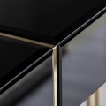 Luxusní art-deco konzolový stolek Steyern v lesklém černém provedení se šuplíkem a párem dvou zlatých kovových podstav 120cm