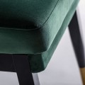 Art-deco designová čalouněná jídelní židle Brilon s potahem ze sametu se vzorem zelené barvy na černo-zlatých nohou 84cm