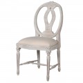 Masivní bílá čalouněná provence jídelní židle Cinderella v off white barvě s vyřezávanými detaily zdobenými patinou a oválným opěradlem