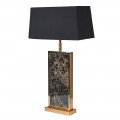 Stylová art deco stolní lampa Deby s kovovou konstrukcí ve zlaté lesklé barvě, černým textilním stínítkem a vklíněným mramorovým dekorem v černé barvě