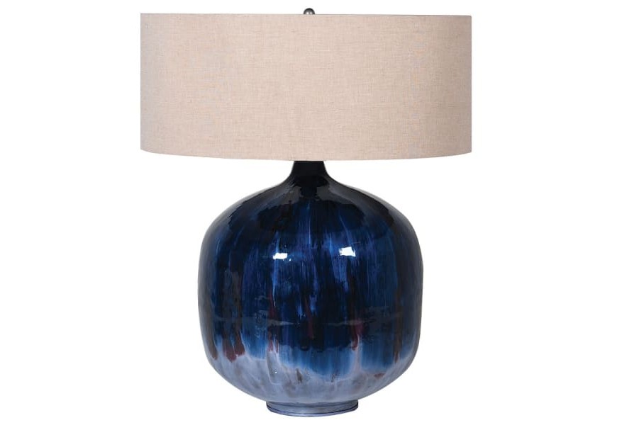 Stylová art deco stolní lampa Laguna s keramickou podstavou safírově modré barvy s béžovým textilním stínítkem