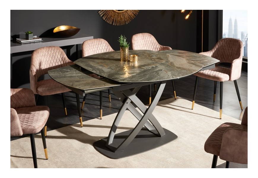 Moderní industriální jídelní stůl Lutz II s kovovou černou konstrukcí a překříženými nožičkami a vrchní keramickou mramorovou oválnou deskou