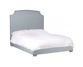 Retro stylová manželská postel Acara s modrým proužkovaným potahem a vysokým vykrojeným čelem 194cm