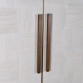 Art deco moderní barová skříňka Pompye bílé barvy z bílého masivu s kovovým zdobením v antické zlaté barvě 181cm