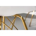 Art-deco bílá jídelní židle Scandinavia z eko kůže s kovovými nožičkami ve zlaté barvě 85cm