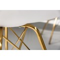 Art-deco bílá jídelní židle Scandinavia z eko kůže s kovovými nožičkami ve zlaté barvě 85cm