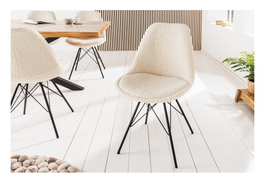 Moderní buklé jídelní židle Scandinavia bílá s černými nožičkami z kovu 86cm