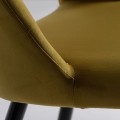 Art deco moderní jídelní židle Celia se sametovým okrovým potahem a černýma nohama z kovu 86cm