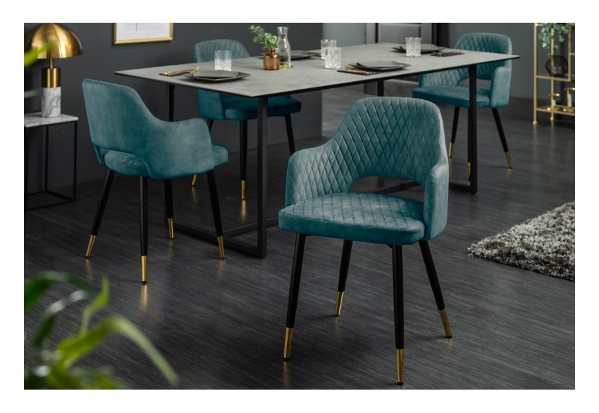 Designová jídelní židle Decora s petrolejově modrým sametovým čalouněním a kovovými nožičkami se zlatým zakončením