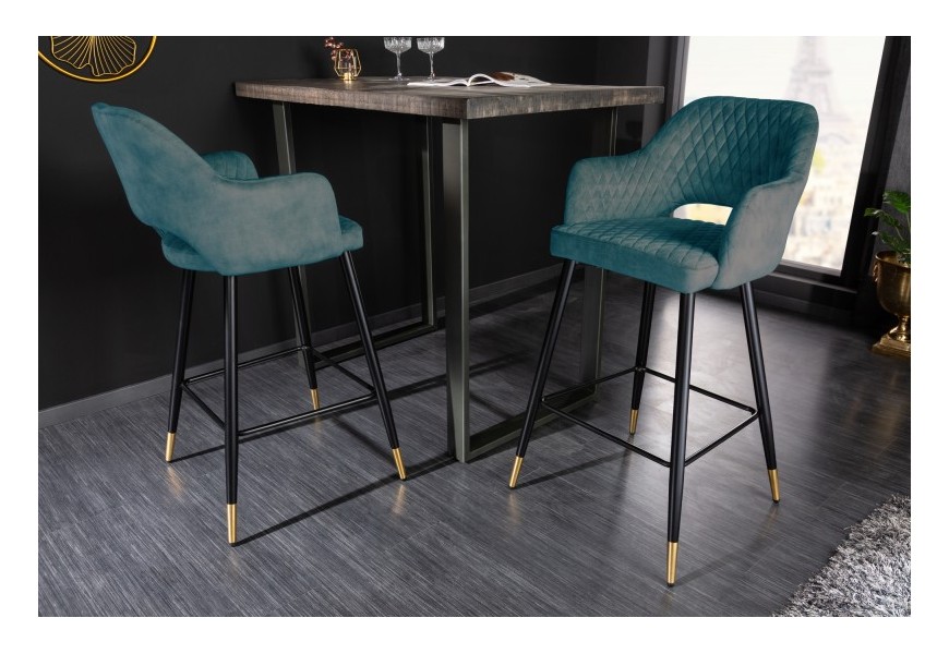 Designová barová židle Decora petrolejově zelená se sametovým čalouněním a černými kovovými nožičkami