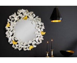 Designové glamour nástěnné zrcadlo Ginko s ozdobným kovovým rámem z listů ginka stříbrné barvy 95cm