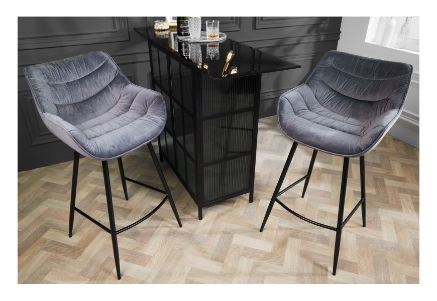 Designová barová židle Kotor s šedým sametovým potahem a černýma nohama z kovu 105cm