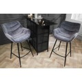 Designová industriální barová židle Kotor v šedém provedení se sametovým čalouněním a černýma nohama