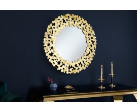 Art deco závěsné zrcadlo Flovia kulatého tvaru se zlatým kovovým rámem vytvořeným z kulatých lupenů 82cm