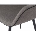 Černý detail prošívání na šedém textilním čalounění jídelní židle Forma Moderna