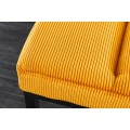 Příjemné manšestrové čalounění lavice Soreli v hořčicově žluté barvě zaručí pohodlí