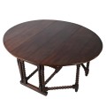 Klasický kulatý jídelní stůl Azrael z masivního dřeva s rozkladatelnou deskou a šuplíky 148cm