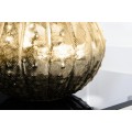 Glamour zlatá tepaná stolní lampa Ředěse kulatého tvaru s černým stínítkem z textilie