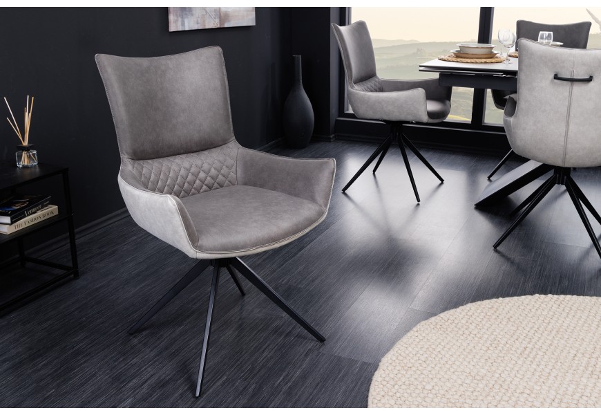 Designov&eacute; j&iacute;deln&iacute; křeslo Loren v &scaron;ed&eacute;m proveden&iacute; s opěrkami a překř&iacute;žen&yacute;ma čern&yacute;ma nohama 89cm