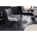 Designov&eacute; j&iacute;deln&iacute; křeslo Loren v &scaron;ed&eacute;m proveden&iacute; s opěrkami a překř&iacute;žen&yacute;ma čern&yacute;ma nohama 89cm