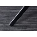 Designov&eacute; j&iacute;deln&iacute; křeslo Loren v &scaron;ed&eacute;m proveden&iacute; s opěrkami a překř&iacute;žen&yacute;ma čern&yacute;ma nohama 89cm