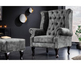 Luxusn&iacute; vintage křeslo Marlon s &scaron;ed&yacute;m čalouněn&iacute;m s chesterfield pro&scaron;&iacute;v&aacute;n&iacute;m a masivn&iacute;mi nožičkami