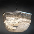 Závěsný skleněný lustr Lania se skleněnými pruty a se stříbrnou kovovou konstrukcí v art deco stylu