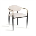 Luxusní glamour jídelní židle s čalouněnou opěrkou a sedací částí s bílým potahem ze strukturované látky s kovovými nožičkami a opěrkovou konstrukcí v černé barvě se zlatými detaily
