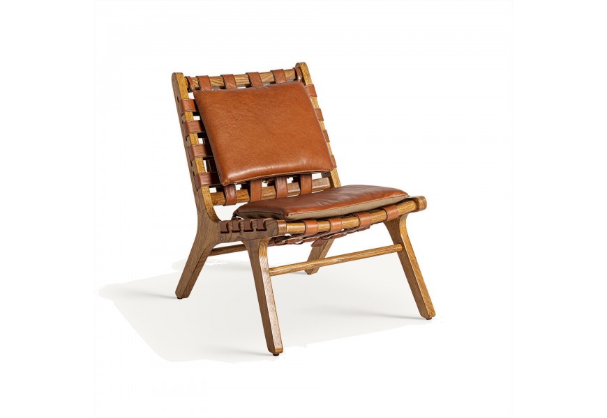 Luxusní kožené křeslo Remus z jasanového dřeva s koženými polštáři na zádové a sedací části upevněnými popruhy s přezkou v koňakové hnědé barvě