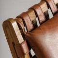 Luxusní moderní křeslo Remus s odnímatelnými koženými polštáři s designovými popruhy hnědá 54 cm
