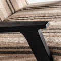 Luxusní designové křeslo Asta s proužkovaným čalouněním v odstínech hnědé a s černým dřevěným rámem 73 cm