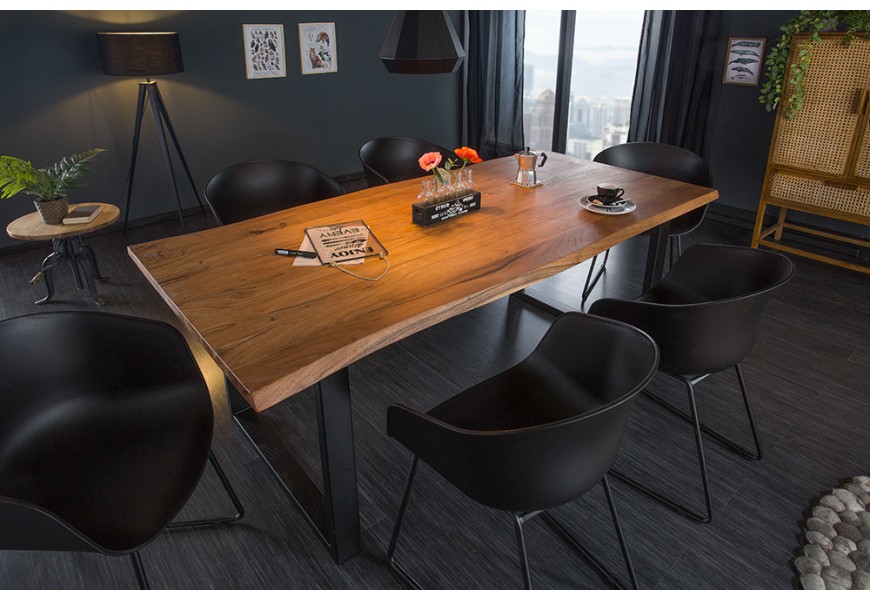 Designový hnědý jídelní stůl Mammut s vrchní deskou z masivního akáciového dřeva a se dvěma nožičkami ve tvaru U z kovu v černé barvě v industriálním stylu